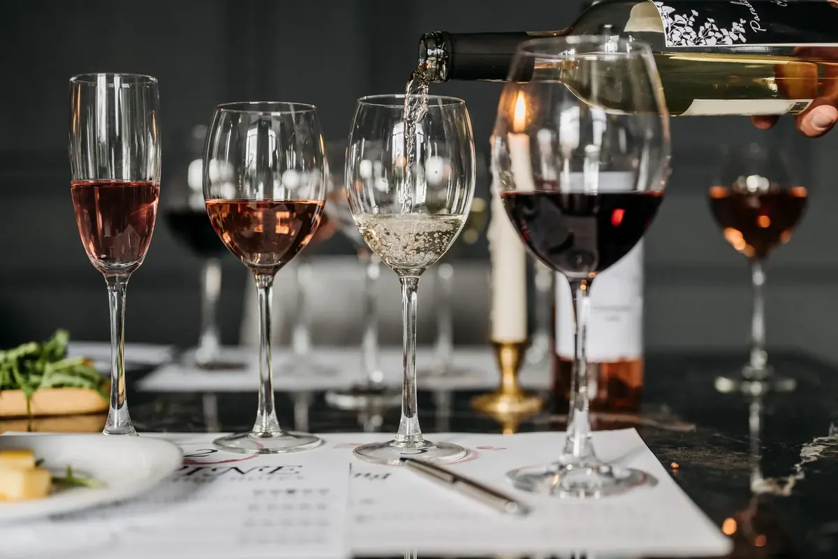 Glasses of red, white and rosé wine set out for a tasting